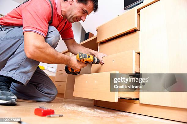 assembling furniture - commode stockfoto's en -beelden