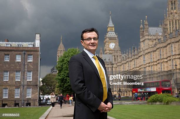 Pascal Soriot, chief executive officer of AstraZeneca Plc, poses for a photograph outside the Houses of Commons after his appearance at Parliament's...