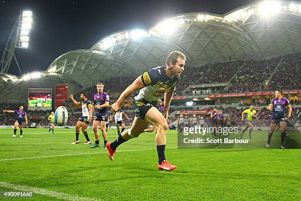 Michael Morgan of the Cowboys scores a try during the NRL Second Preliminary Final match between the Melbourne Storm and the North Queensland Cowboys...