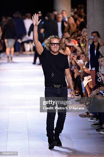 Designer Peter Dundas walks the runway after the Roberto Cavalli fashion show as part of Milan Fashion Week Spring/Summer 2016 on September 26, 2015...