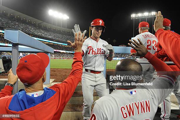 Jason Nix of the Philadelphia Phillies returns to the dugout after hitting a homerun against the Los Angeles Dodgers at Dodger Stadium on April 23,...