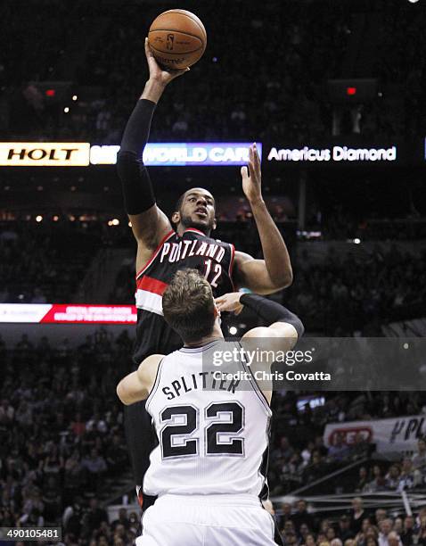 LaMarcus Aldridge of the Portland Trail Blazers shoots over Tiago Splitter of the San Antonio Spurs in Game Two of the Western Conference Semifinals...