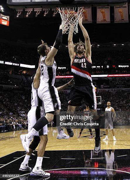 Robin Lopez of the Portland Trail Blazers shoots over Tiago Splitter of the San Antonio Spurs in Game Two of the Western Conference Semifinals during...