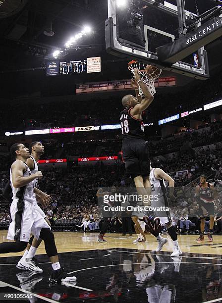 Nicolas Batum of the Portland Trail Blazers dunks the ball against the San Antonio Spurs in Game Two of the Western Conference Semifinals during the...