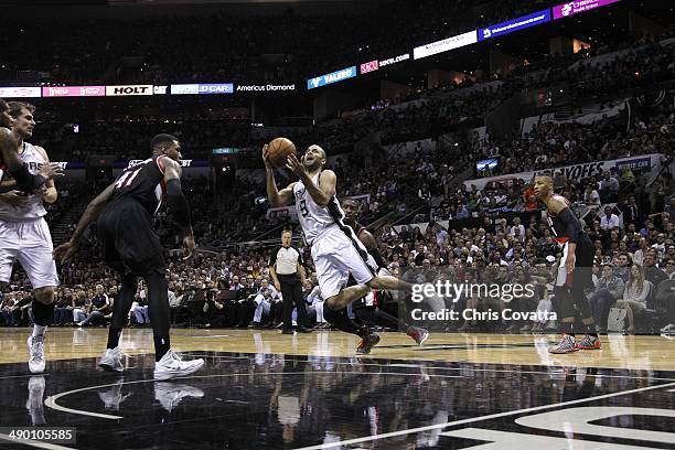 Tony Parker of the San Antonio Spurs leaps to the basket against the Portland Trail Blazers in Game Two of the Western Conference Semifinals during...