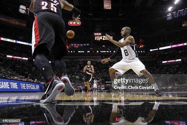 Patty Mills of the San Antonio Spurs moves toward the ball as Mo Williams of the Portland Trail Blazers throws it inbounds to Nicolas Batum in Game...