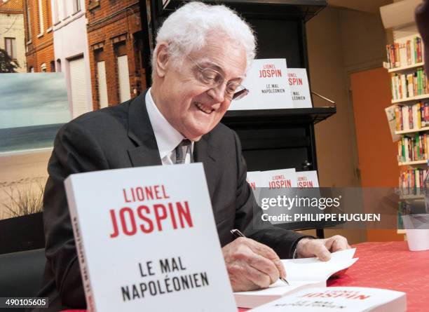 Former Prime minister Lionel Jospin signs his latest book, entitled "Le mal napoleonien" , on May 13, 2014 in Tourcoing. The book is an essay which...