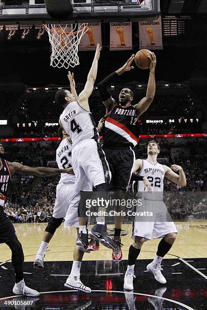 LaMarcus Aldridge of the Portland Trail Blazers shoots over Danny Green of the San Antonio Spurs in Game Two of the Western Conference Semifinals...