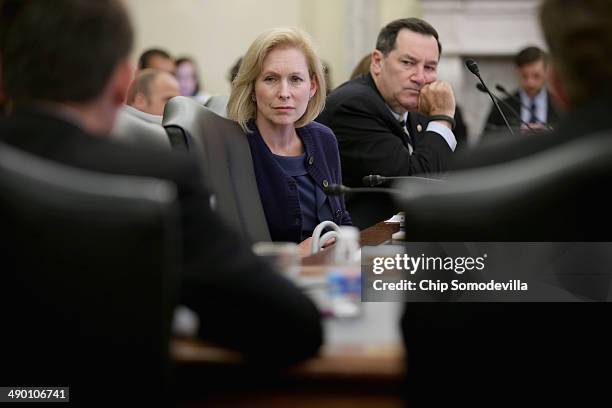 Senate Agriculture Committee member Sen. Kristen Gillibrand and Sen. Joe Donnelly listen to testimony in the Russell Senate Office Building May 13,...