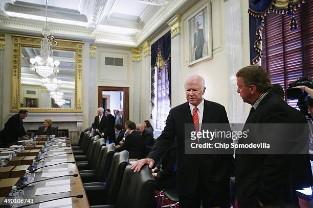 Senate Agriculture Committee member Sen. Saxby Chambliss talks with CME Group Executive Chairman and President Terrence Duffy before a committee...