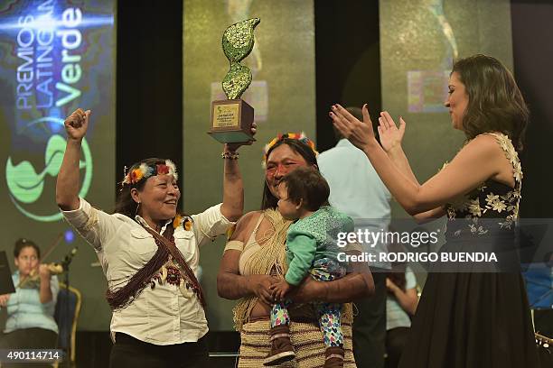 Omani Manuela and Patricia Nenquihui, huaoranis natives receive the award "Latinoamerica verde" at the Crystal Palace in Guayaquil, Ecuador on...