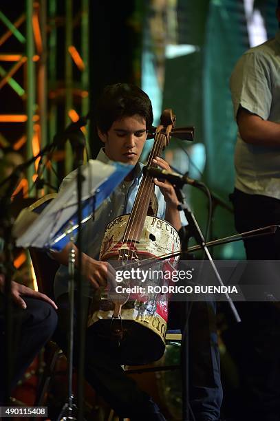 Paraguay's Cateura Youth Orchestra of Recycled instruments play during the Awards Ceremony "Latinoamerica Verde" at the Crystal Palace in Guayaquil,...