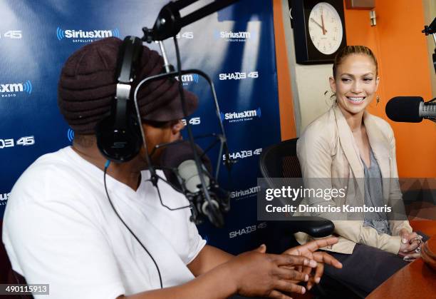 Sway Calloway and Jennifer Lopez during 'Sway in the Morning' on Eminem's Shade 45 at SiriusXM Studios on May 13, 2014 in New York City.