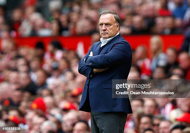 Dick Advocaat manager of Sunderland looks on during the Barclays Premier League match between Manchester United and Sunderland at Old Trafford on...