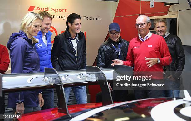 Marketing director Harry Unflat of Audi talkes to former skier Maria Hoefl Riesch, headcoach Ralph Hasenhuettl of Ingolstadt, Marcus Hoefl,...