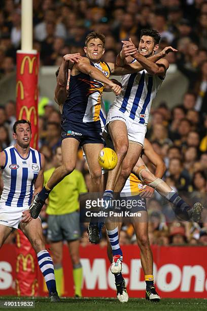 Brad Sheppard of the Eagles and Jarrad Waite of the Kangaroos contest for a mark during the AFL Second Preliminary Final match between the West Coast...
