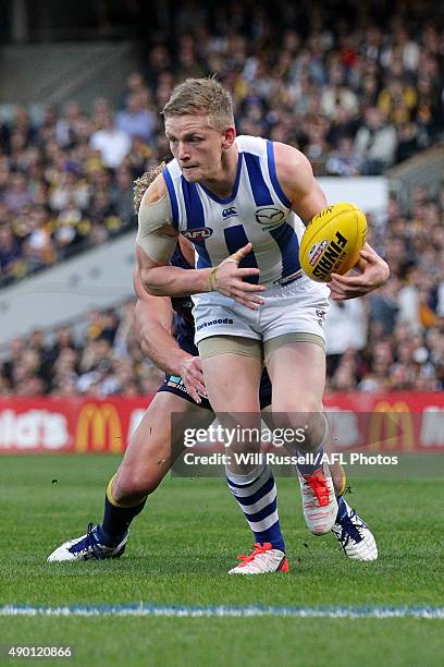 Jack Ziebell of the Kangaroos controls the ball during the AFL Second Preliminary Final match between the West Coast Eagles and the North Melbourne...