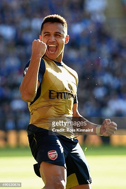 Alexis Sanchez of Arsenal celebrates scoring his team's fourth and his hat trick goal during the Barclays Premier League match between Leicester City...