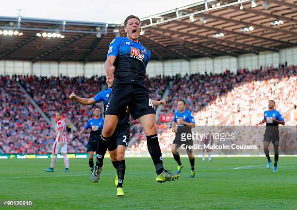 Dan Gosling of Bournemouth celebrates scoring his team's first goal during the Barclays Premier League match between Stoke City and A.F.C....