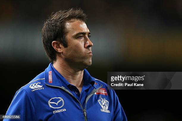 Brad Scott, coach of the Kangaroos looks on during the AFL Second Preliminary Final match between the West Coast Eagles and the North Melbourne...