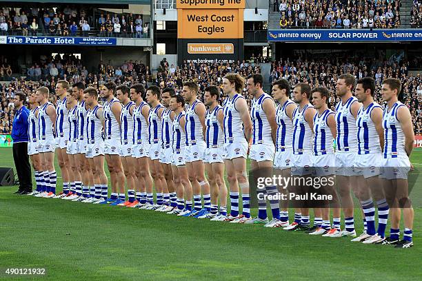 The Kangaroos line up for the national anthem during the AFL Second Preliminary Final match between the West Coast Eagles and the North Melbourne...