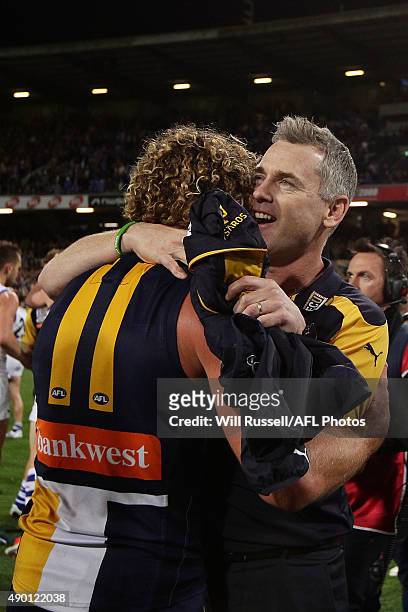 Matt Priddis and Adam Simpson, coach of the Eagles embrace after winning the AFL Second Preliminary Final match between the West Coast Eagles and the...