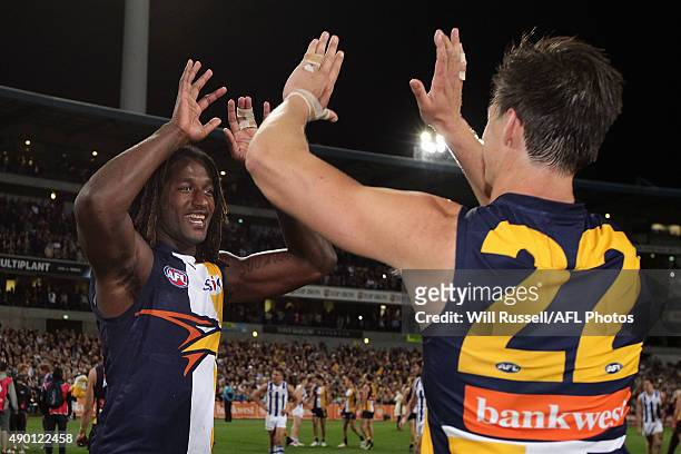 Nic Naitanui and Callum Sinclair of the Eagles celebrate after winning the AFL Second Preliminary Final match between the West Coast Eagles and the...