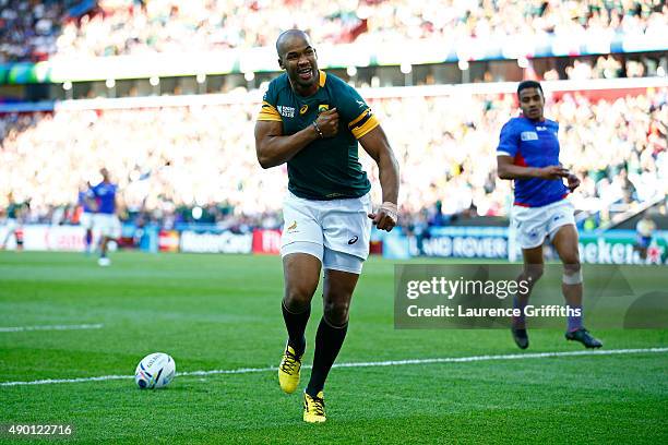 Pietersen of South Africa celebrates scoring the opening try during the 2015 Rugby World Cup Pool B match between South Africa and Samoa at Villa...