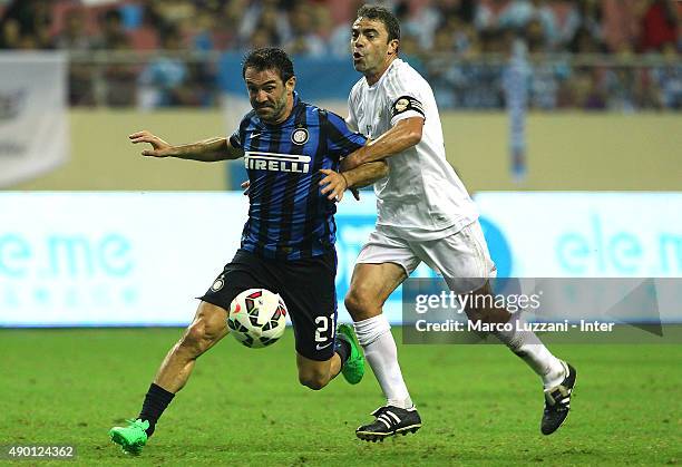Giorgios Karagounis of Inter Forever competes for the ball with Manuel Sanchis of Real Madrid during The 2015 Winning League International Legends...