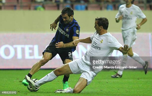 Giorgios Karagounis of Inter Forever competes for the ball with Francisco Pavon of Real Madrid during The 2015 Winning League International Legends...