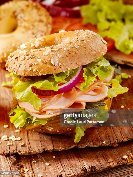 turkey bagel sandwich - bagel stock pictures, royalty-free photos & images