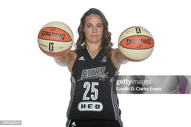 Becky Hammon of the San Antonio Stars poses for a photo during WNBA Media Day at the AT&T Center on May 9, 2014 in San Antonio, Texas. NOTE TO USER:...