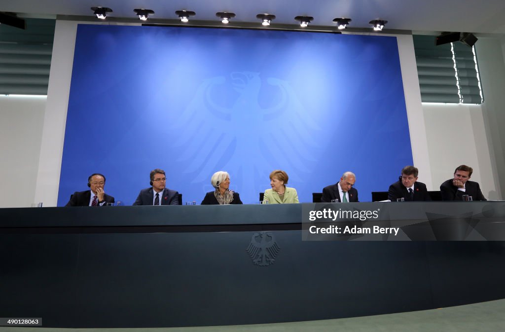 Merkel Meets With World Finance, Economic And Labor Leaders