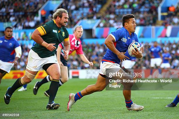 Tim Nanai-Williams of Samoa breaks past Jannie Du Plessis of South Africa during the 2015 Rugby World Cup Pool B match between South Africa and Samoa...