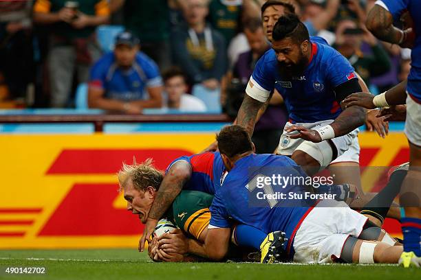 Schalk Burger of South Africa goes over to score his teams third try during the 2015 Rugby World Cup Pool B match between South Africa and Samoa at...