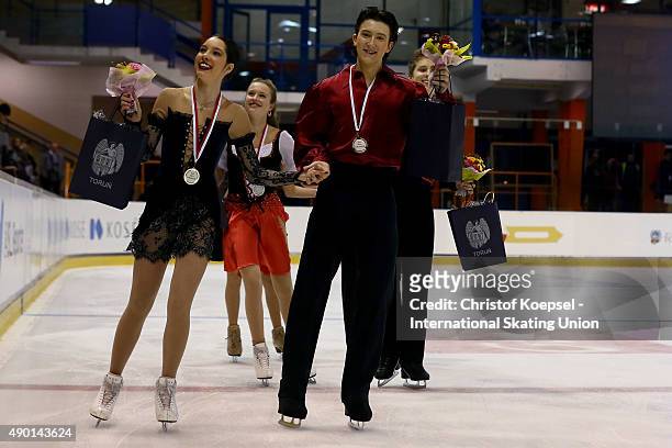 Winners Lorraine McNamara and Quinn Carpenter of United States do a lap o honour after the medal ceremony of the junior ice free dance of the ISU...