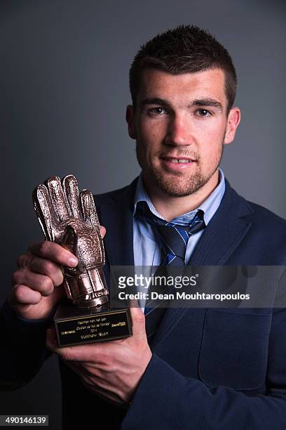 Mathew Ryan of Australia and Club Brugge poses with his 'Jupiler Pro League Goalkeeper of the Year 2014 Award' during a Feature Shoot at the Jan...