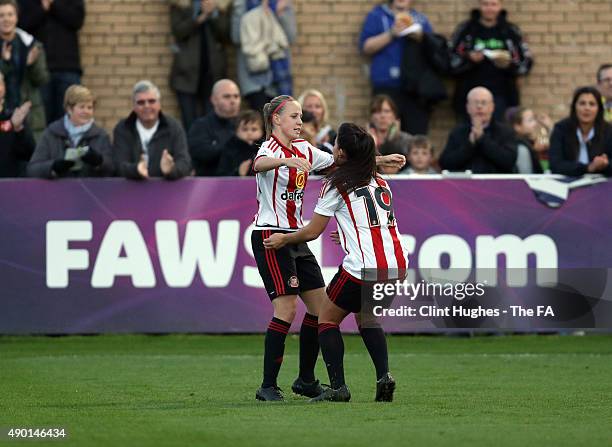 Beth Mead of Sunderland AFC Ladies celebrates with team-mate Brooke Chaplen after she scores the first goal of the game for her side during the FA...