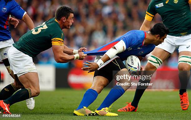 George Pisi of Somoa is tackled by Jesse Kriel of South Africa during the 2015 Rugby World Cup Pool B match between South Africa and Samoa at Villa...