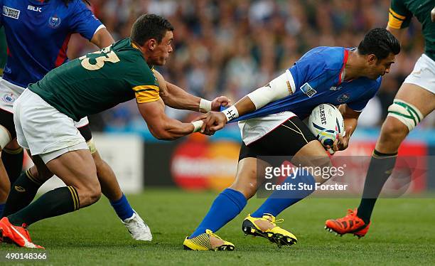 George Pisi of Somoa is tackled by Jesse Kriel of South Africa during the 2015 Rugby World Cup Pool B match between South Africa and Samoa at Villa...