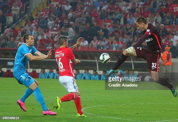 Artem Dzuba of Zenit St.-Petersburg and Salvatore Boketti Artem Rebrov of Spartak Moscow in action during the Russian Footbal Premier-League match...
