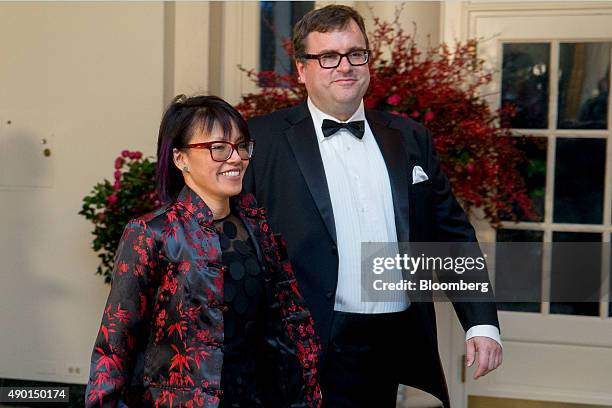 Reid Hoffman, chairman and co-founder of LinkedIn Corp., right, and Michelle Yee arrive at a state dinner in honor of Chinese President Xi Jinping at...