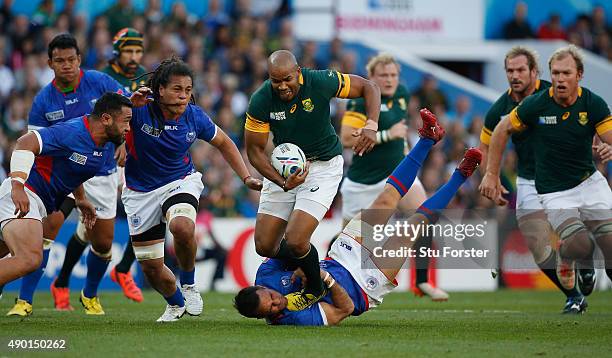 Pietersen of South Africa breaks past Mike Stanley of Samoa during the 2015 Rugby World Cup Pool B match between South Africa and Samoa at Villa Park...