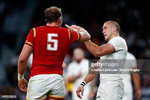 Tempers flare between Mike Brown of England and Alun Wyn Jones of Wales during the 2015 Rugby World Cup Pool A match between England and Wales at...