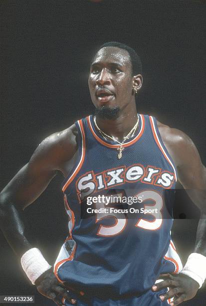 Darryl Dawkins of the Philadelphia 76ers looks on against the Washington Bullets during an NBA basketball game circa 1978 at the Capital Centre in...