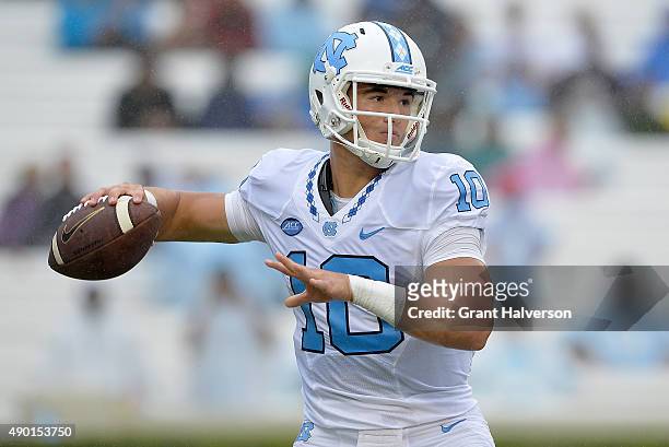 Mitch Trubisky of the North Carolina Tar Heels drops back to pass against the Delaware Fightin Blue Hens during their game at Kenan Stadium on...