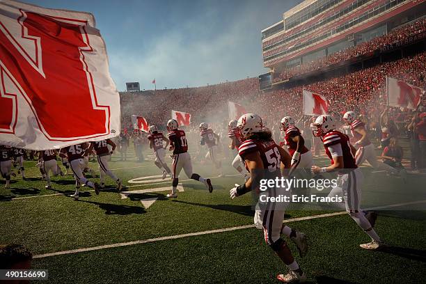 The Nebraska Cornhuskers take the field before their game against the Southern Miss Golden Eagles at Memorial Stadium on September 26, 2015 in...