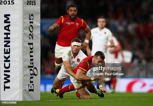 Gareth Davies of Wales goes over to score a try during the 2015 Rugby World Cup Pool A match between England and Wales at Twickenham Stadium on...