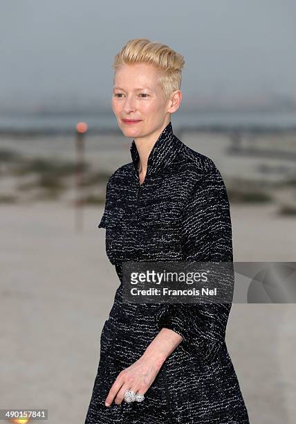 Tilda Swinton attends the Chanel Cruise Collection 2014/2015 Photocall at The Island on May 13, 2014 in Dubai, United Arab Emirates.