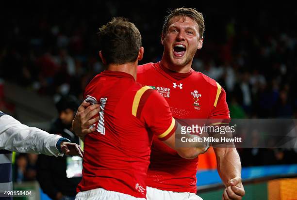 Dan Biggar and Lloyd Williams of Wales celebrate victory after the 2015 Rugby World Cup Pool A match between England and Wales at Twickenham Stadium...